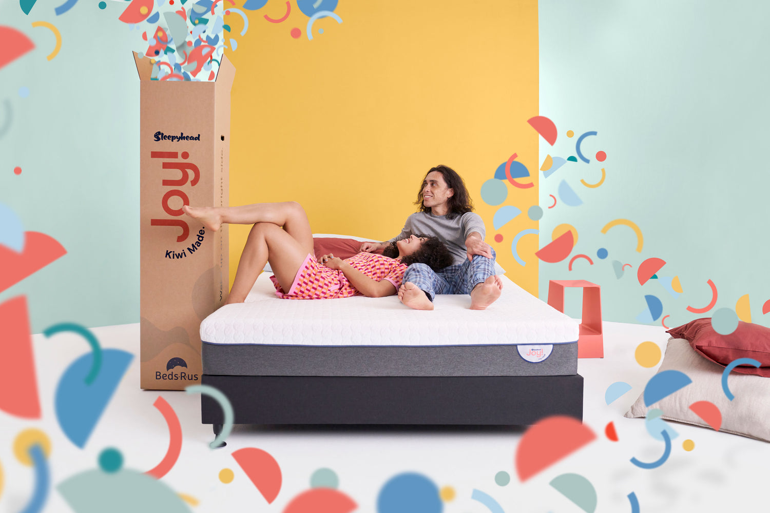 Happy Couple Lying on Joy Mattress - Sharing Comfort and Joyful Moments